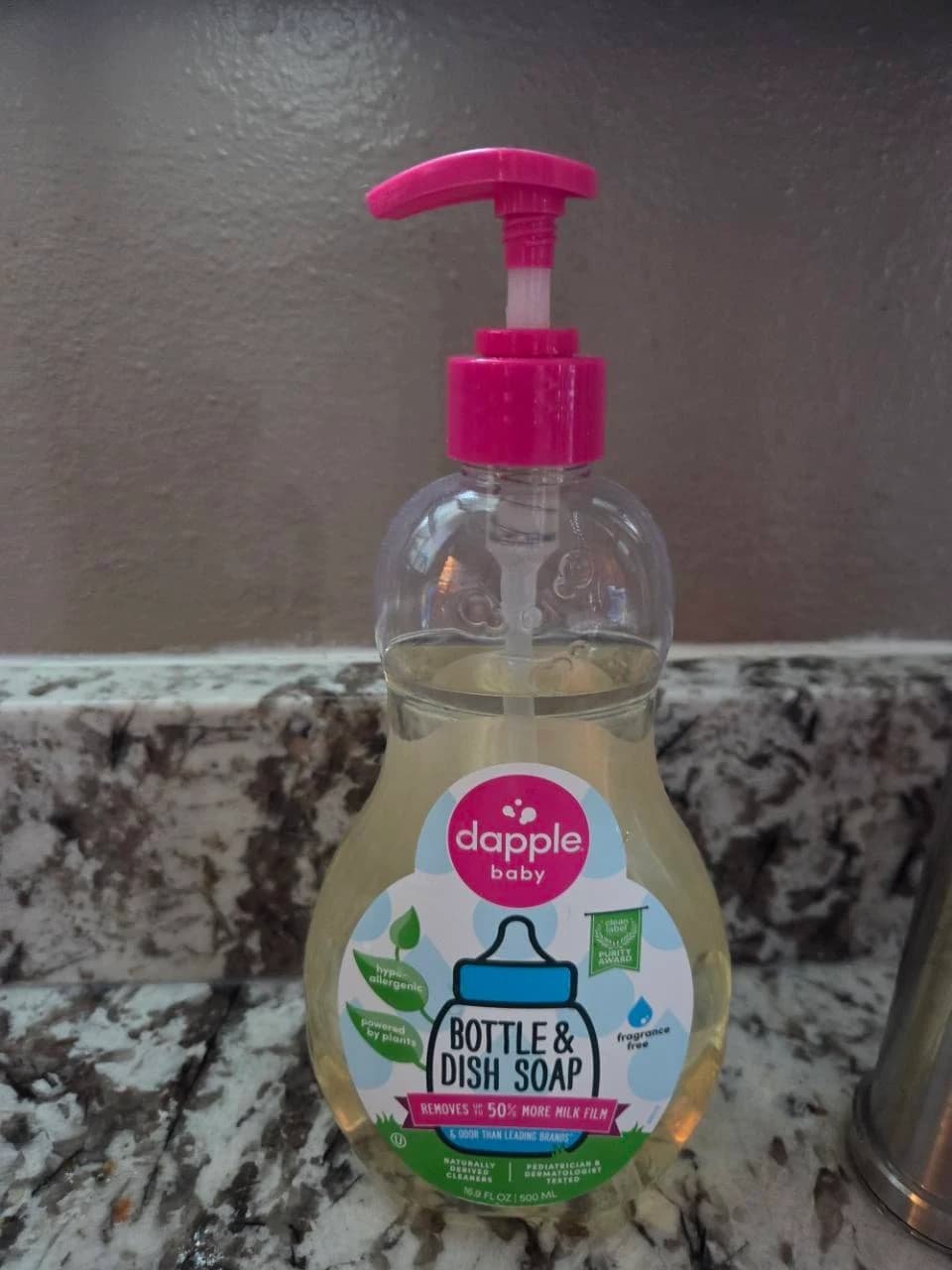 Our pump bottle of fragrance-free Dapple Baby Bottle and Dish Soap on the kitchen counter