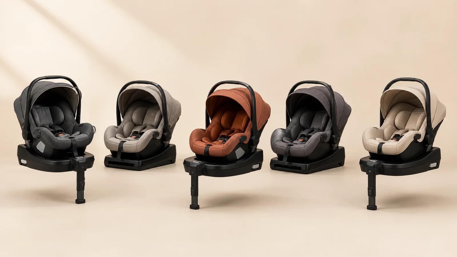 Infant car-seat base with an adjustable support leg contacting a flat vehicle floor