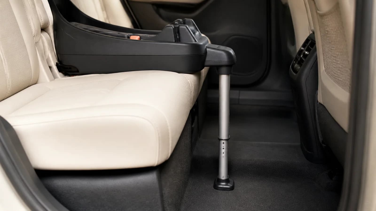 Unbranded infant car seat showing its newborn support cushion and headrest